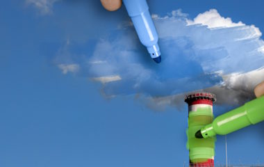 Hands painting blue and green pollution from a chimneyHands painting blue and green pollution from a chimney