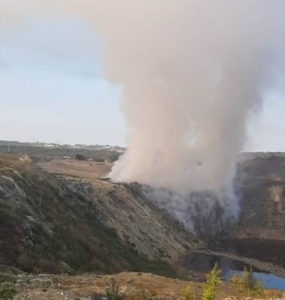Smoke landfill fire copper smelter city Bor Serbia