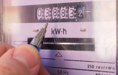 Ballpoint pen showing electricity meter readings.