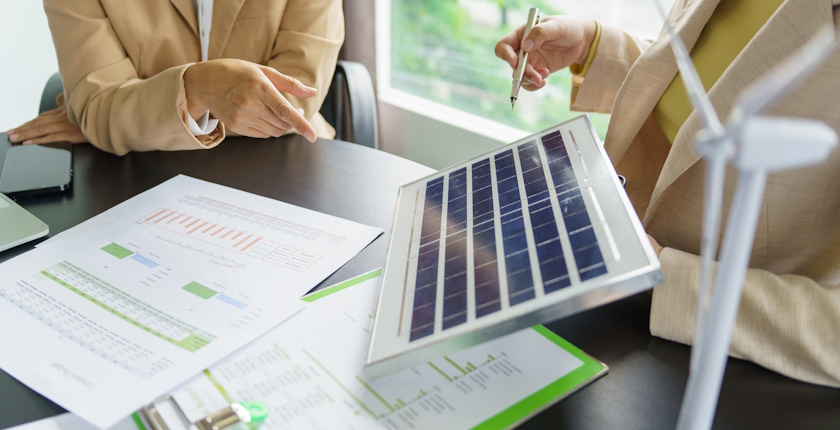 Solar panels green energy Business people working in green eco friendly office business meetingÂ creative ideas for business eco friendly professional teaching corporate people sustainable electricity project business